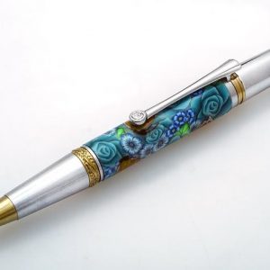 Turquoise Rose with Monarch Butterflies Majestic Squire