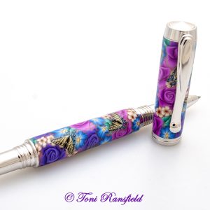 Magenta Rose and Purple Rose with Yellow Swallowtails Rollerball