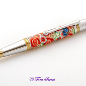 Coral Roses with Blue Butterflies