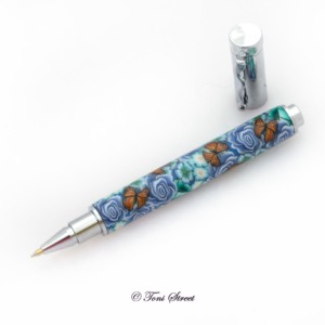 Blue Roses with Monarch Butterflies